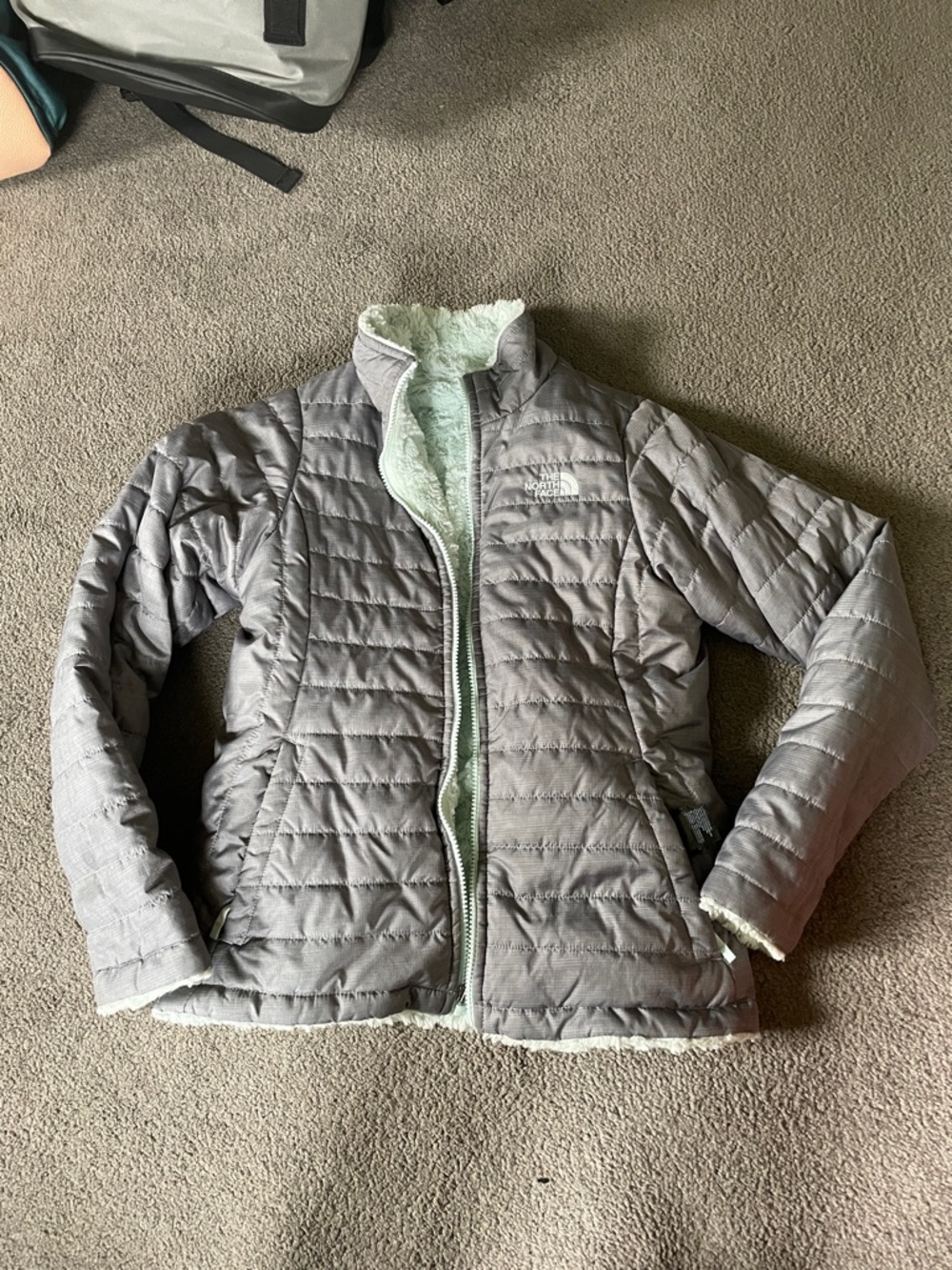 The North Face reversible girls Jacket in Gray with Mint Sherpa Lining